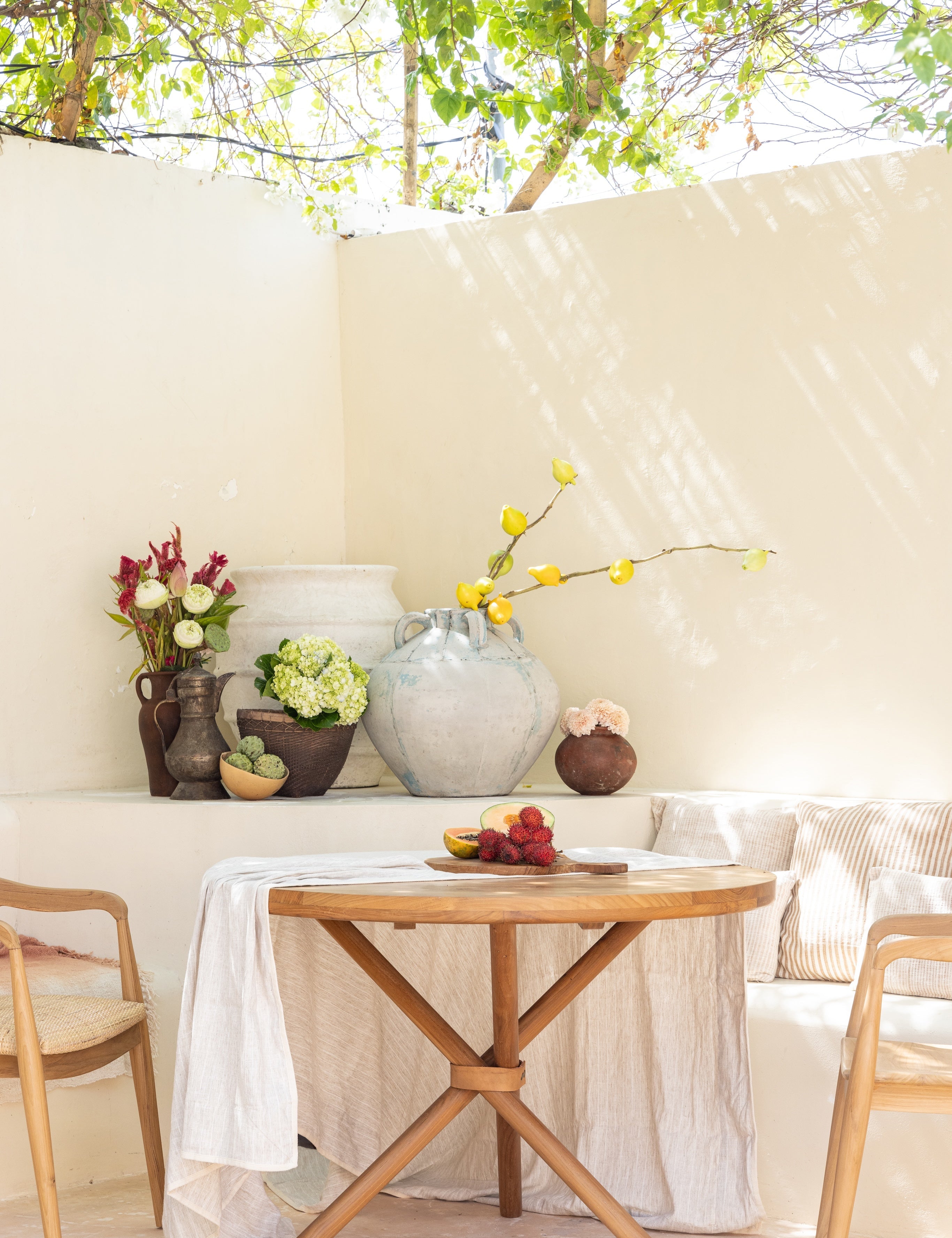 teak table and rattan chairs