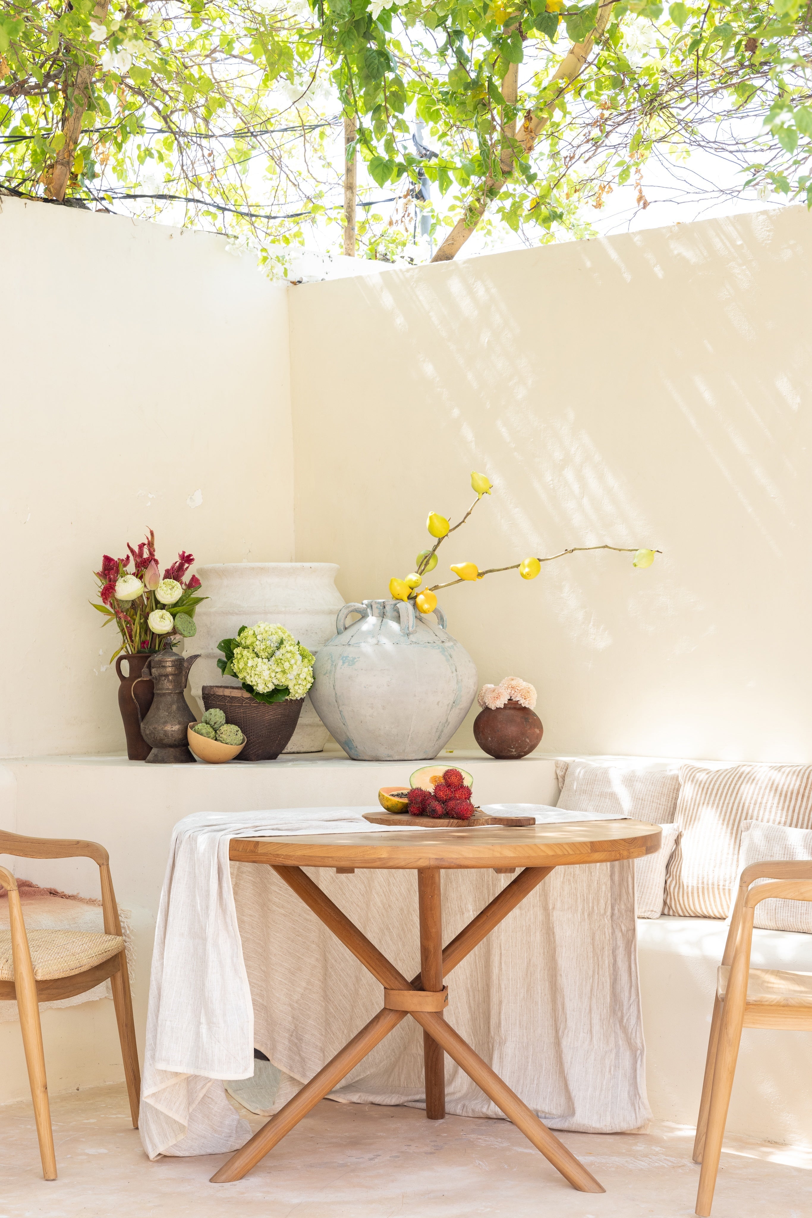 teak table and rattan chairs