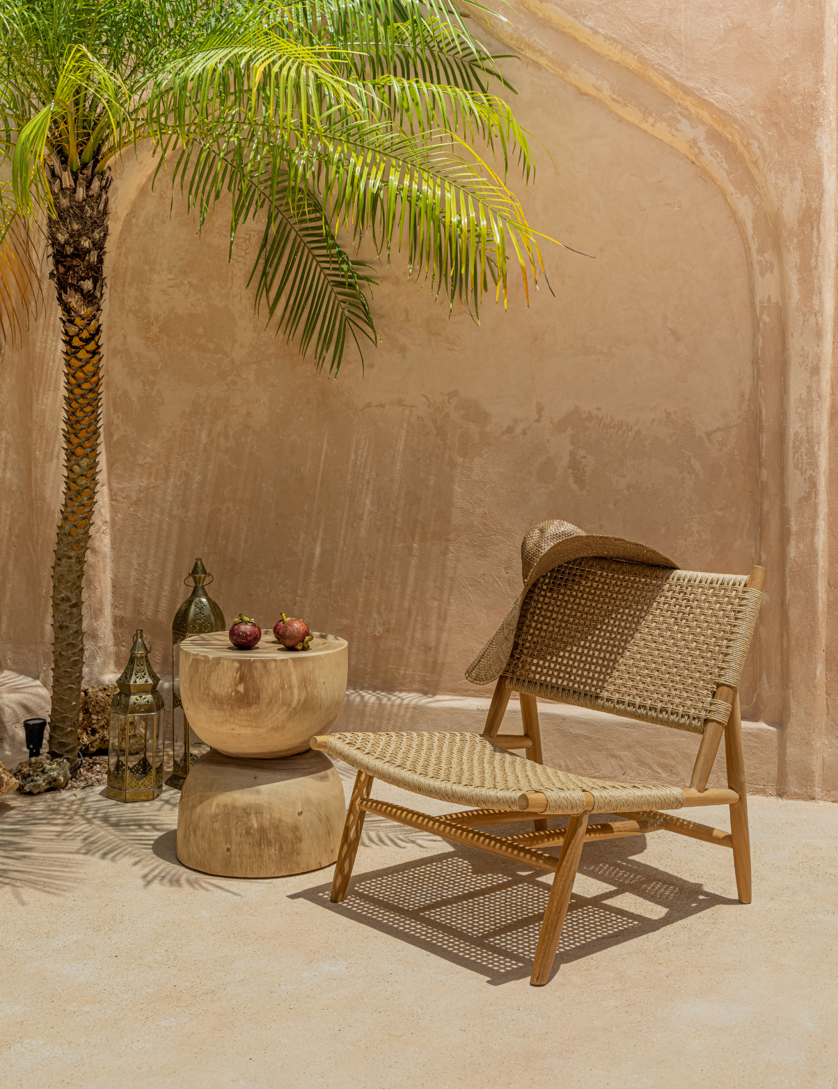 stone texture background with rattan and teak wood furniture in a collage
