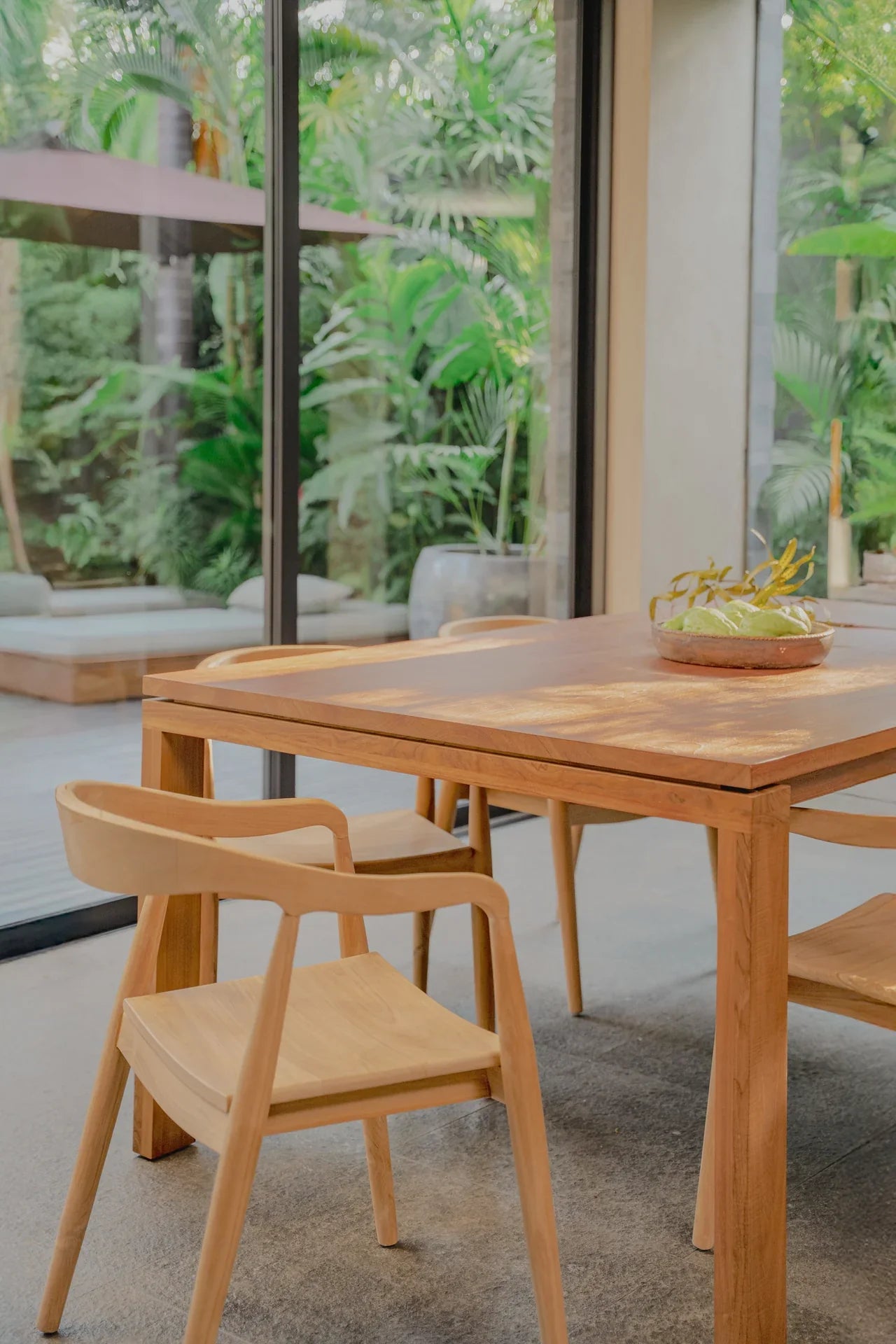 teak dining table with matching chairs