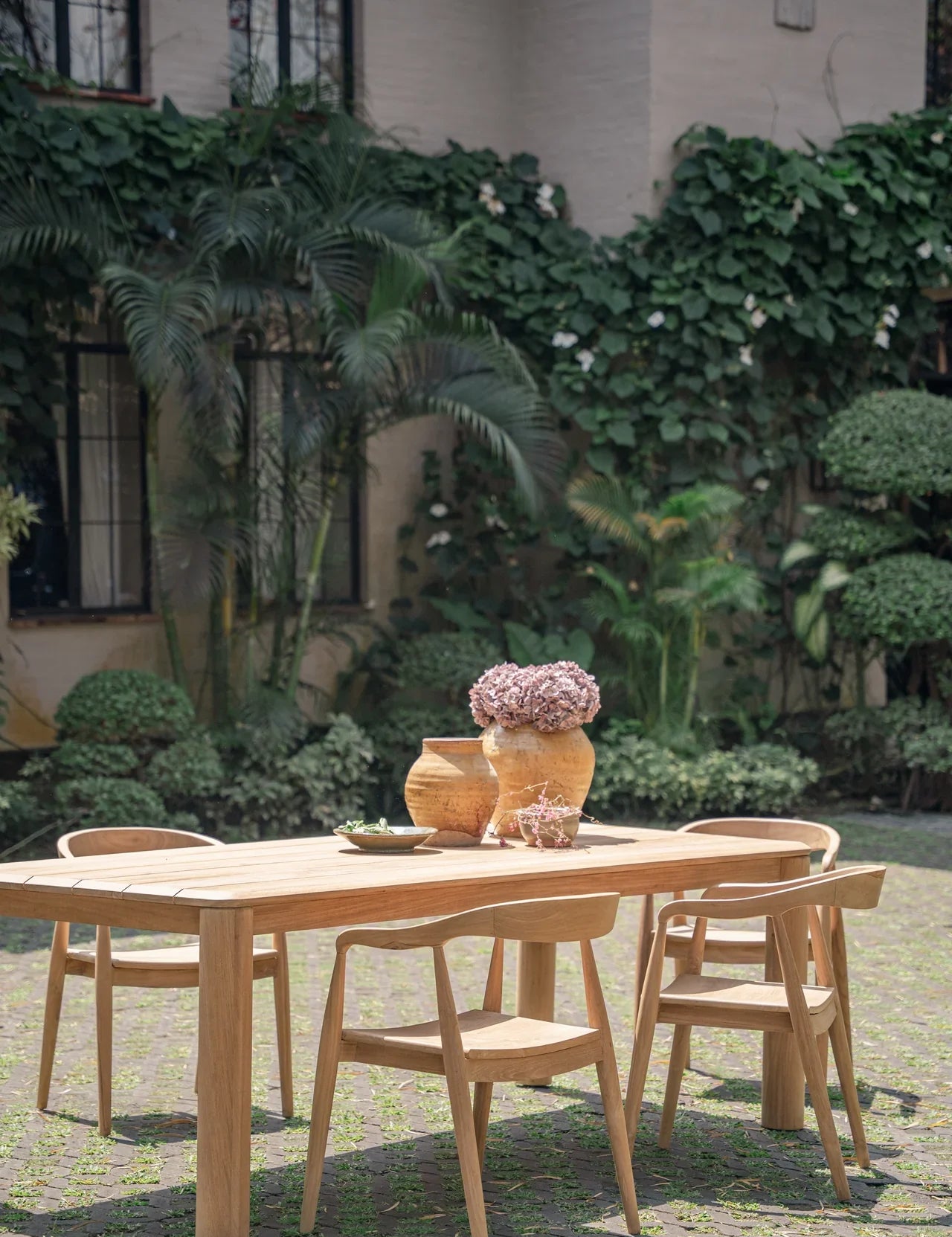 handcrafted teak outdoor dining table and chairs