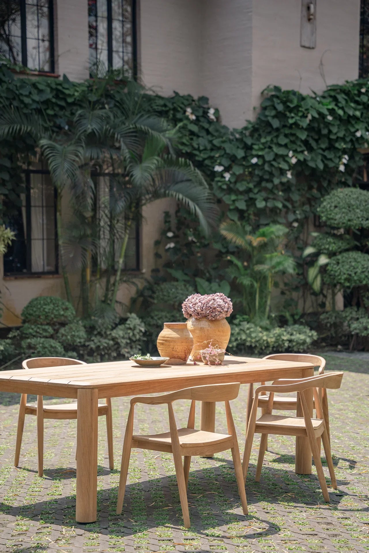 handcrafted teak outdoor dining table and chairs