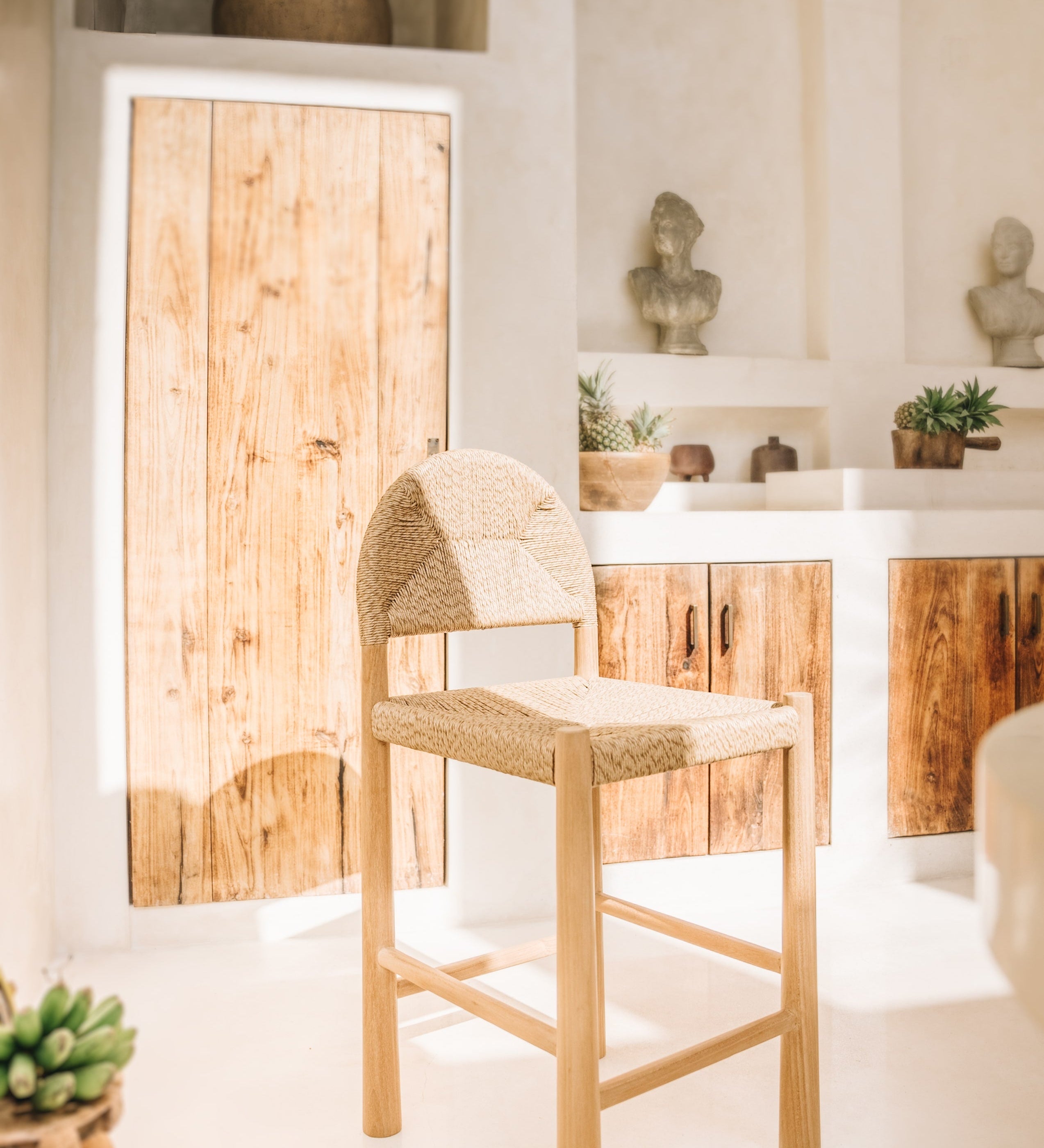 Teak bar stool in an outdoor kitchen in bali 