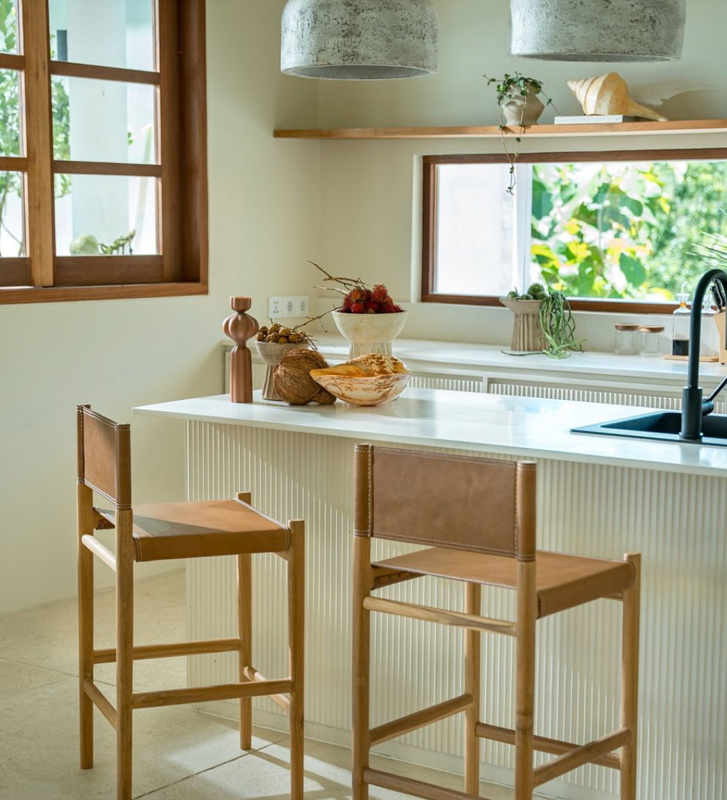 Minimalist Kitchen With Wooden Rattan Chairs