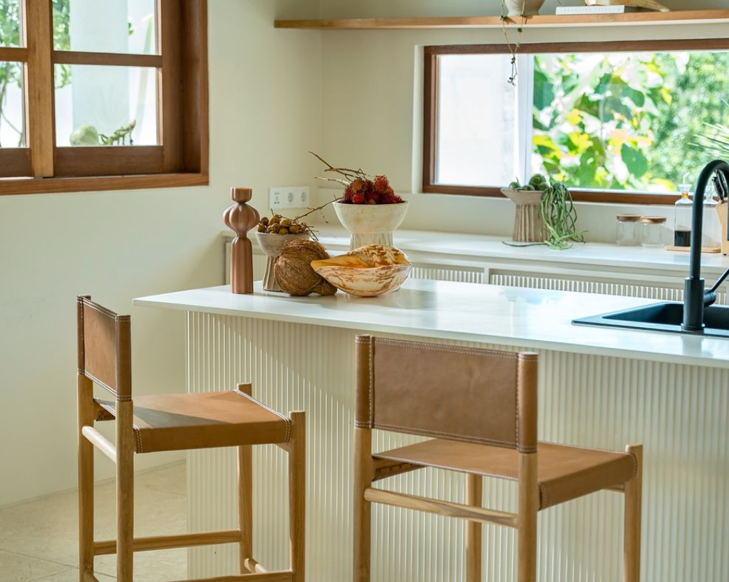 Minimalist Kitchen With Wooden Rattan Chairs