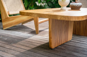 Wooden outdoor table with a chair on a wooden deck