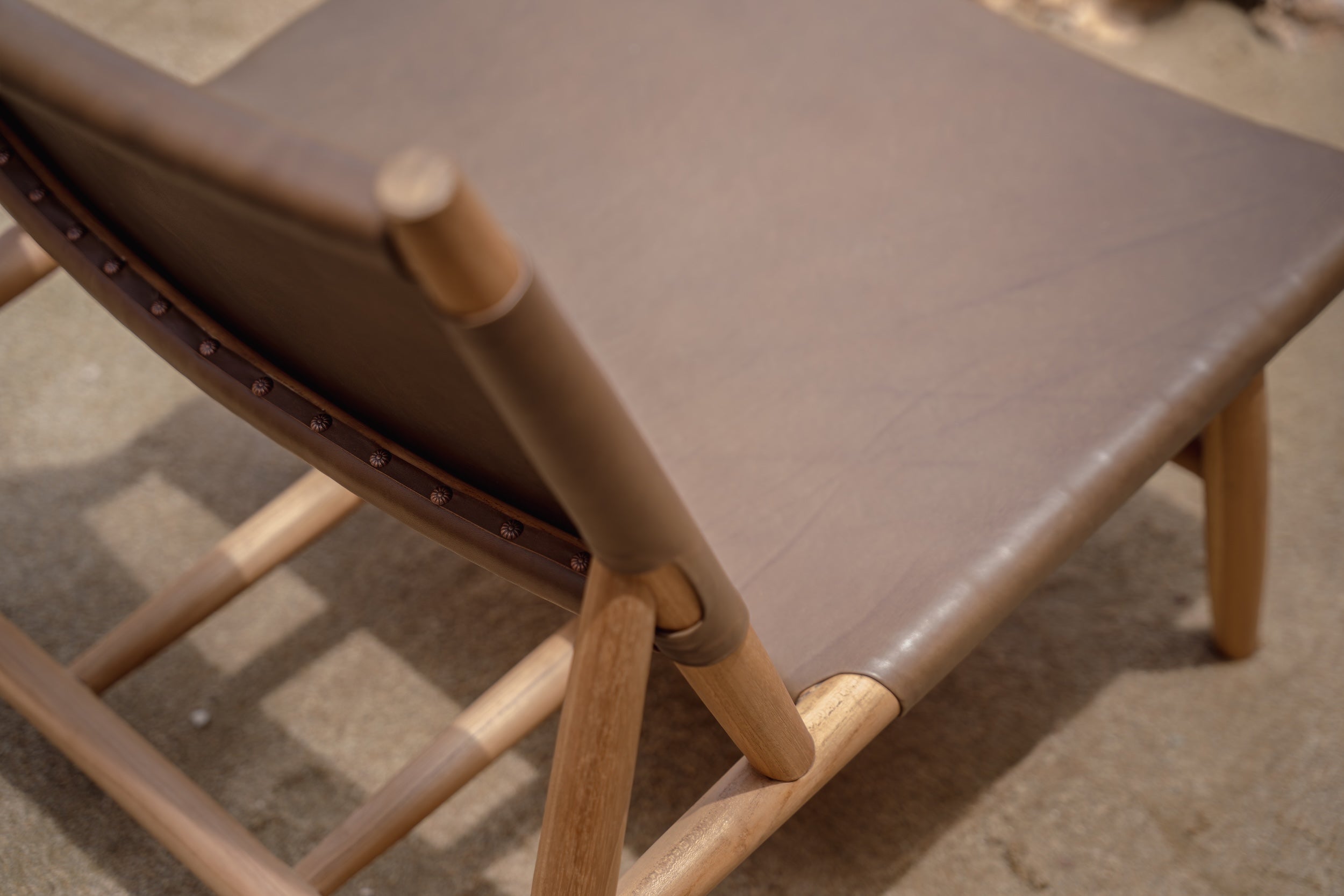 Choco Leather and Teak Lounge Chair